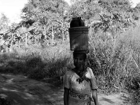 Water lady in Chogo Refugee Setlement by Heidenstrom